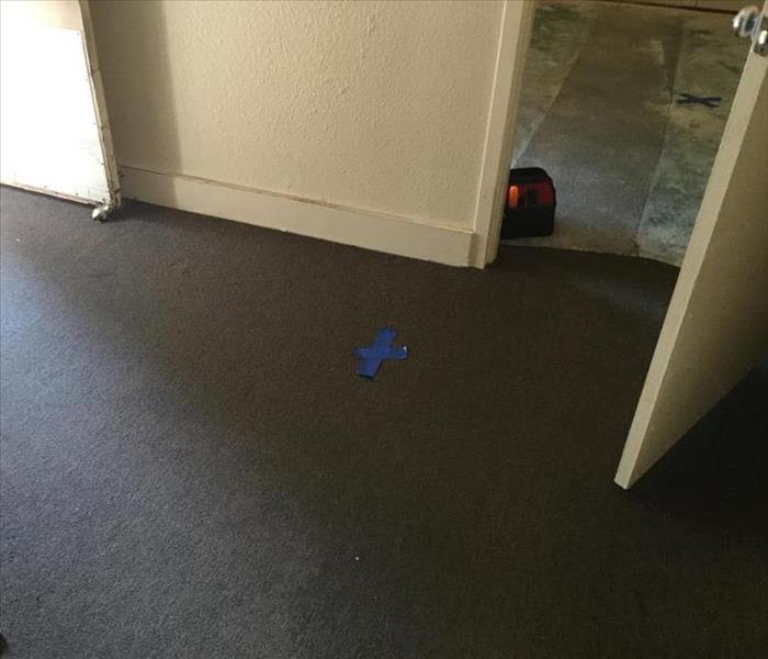 room with wet carpet